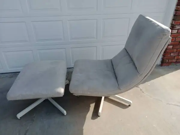 Swivel easy chair and footstool