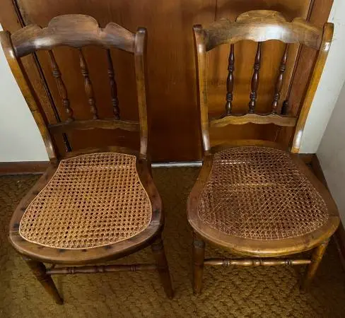 Two Matching Vintage Solid Wood Chairs with Cane Seats