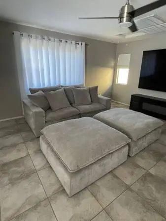 Like new 87” modular cloud sofa and 2 extra large ottoman’s