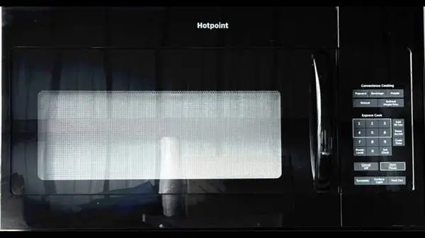 Newer Black Hot Point Over the Range microwave/hood 30 Width