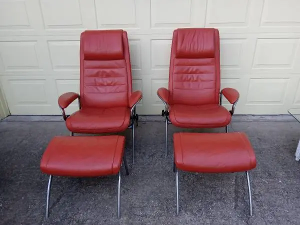 PAIR OF EKORNES STRESSLESS RECLINER CHAIRS AND OTTOMANS