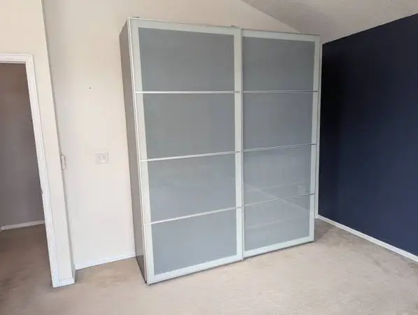 Large wardrobe closet w/ drawers, shoe racks, sliding doors