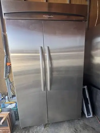 48 Built-in thermador refrigerator has small blemish