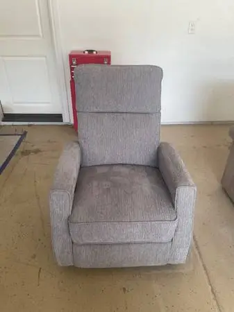 Grey Fabric recliner and swivels