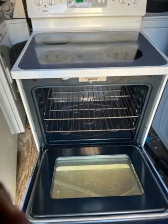 GE glass top electric stove (delivery fee