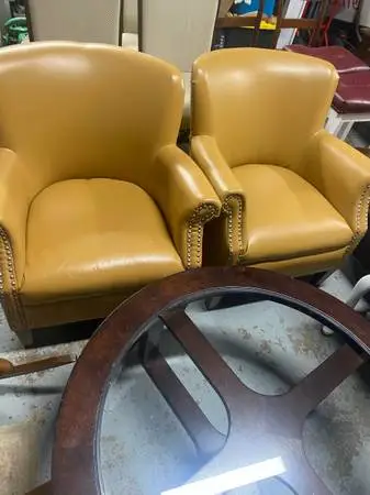 2 small leather chairs