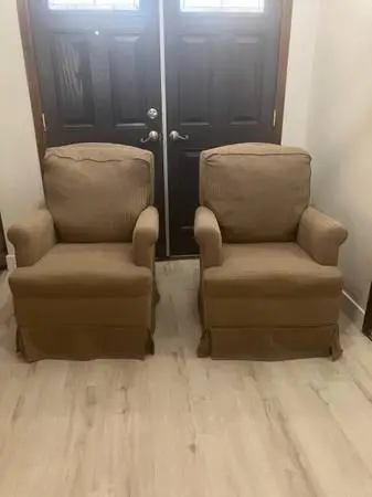 Two beautiful clean, rocker swivel chairs