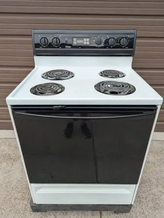 Amana coil top stove SERVICED