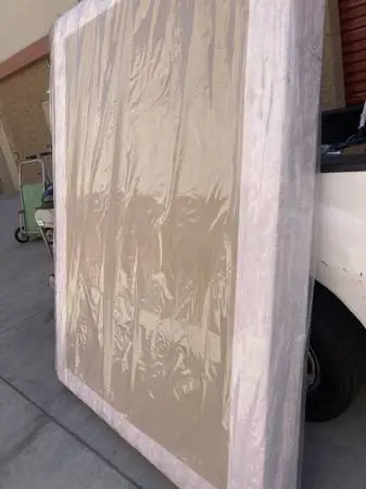 Boxspring/foundation,queen,new in wrapper,help deliver.