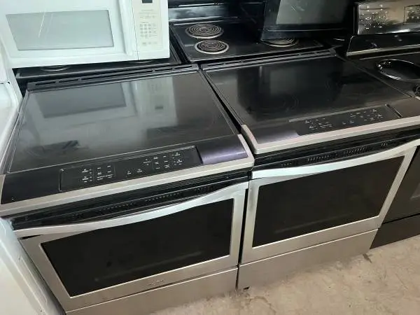 Stainless steel slide in glass top stove
