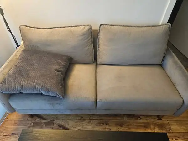Comfy couch + throw pillow