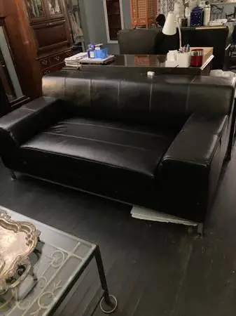 black leather love seat