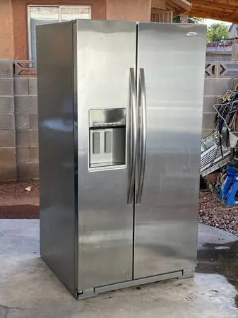 WHIRLPOOL STAINLESS STEEL REFRIGERATOR SIDE BY SIDE