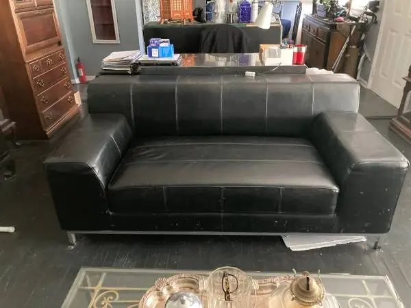 black leather love seat