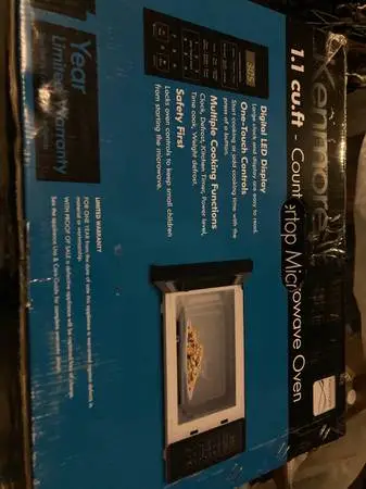 Microwave,black,new,1.1 cu ft,digital,turntable.