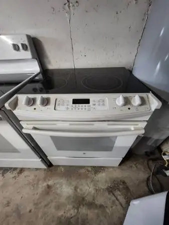 Ge white slide in convection exlarge burners and bridge