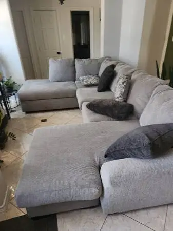 Sectional couch with pillows