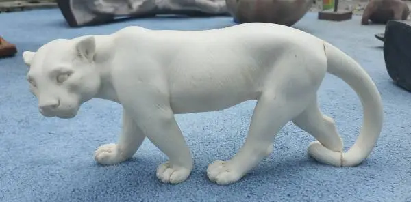 Vintage White Cougar or Puma Walking