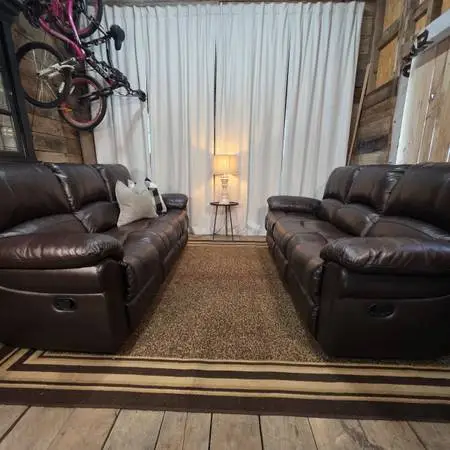 Pair of Brown Leather Dual-Reclining Sofas