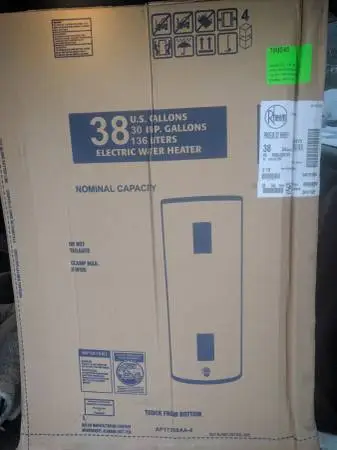Electric water heater, new; Rheem 38 gallon; short tank