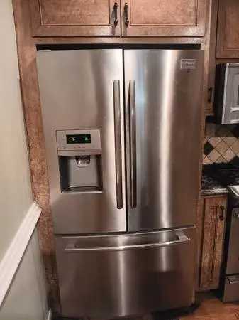 Stainless steel Frigidaire refrigerator and stove