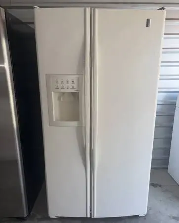 White GE Refrigerator And Freezer