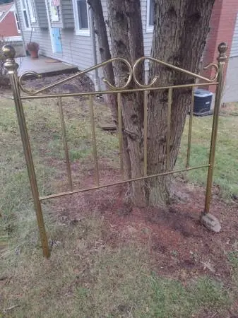 Full size brass headboard