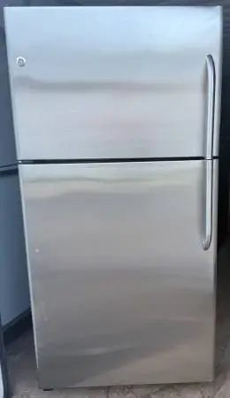 Clean & Tested GE 21.9 cu ft Top-Freezer Fridge Stainless — $300