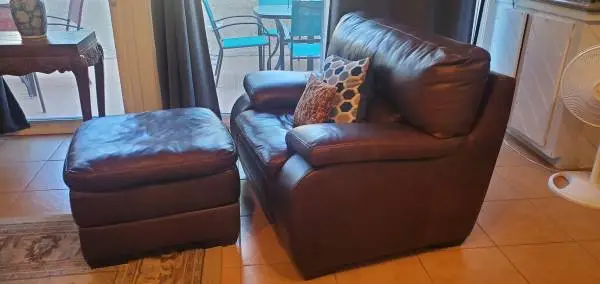 LIKE NEW Single seat smooth REAL leather couch comfortable ottoman