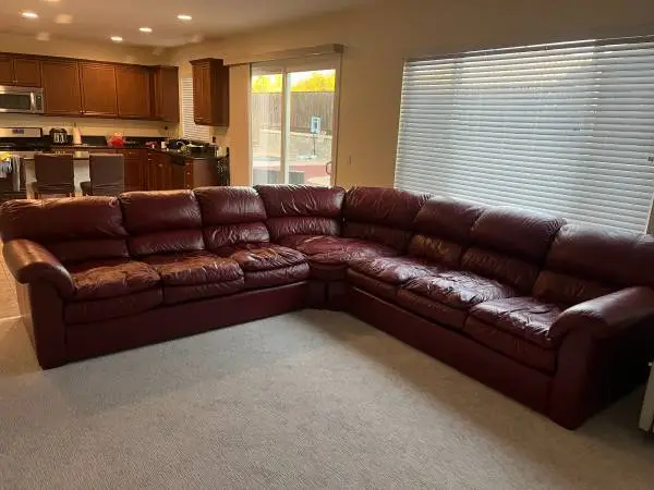 __MUST SELL__ RASPBERRY RED LEATHER SOFA