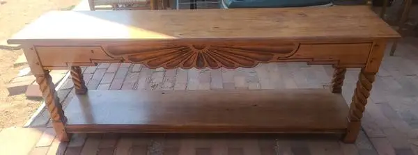 Wood carved long narrow table