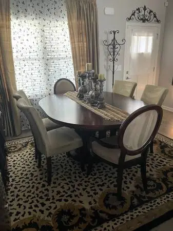 Dining Table heavy duty with leaf 6 chairs good condition.