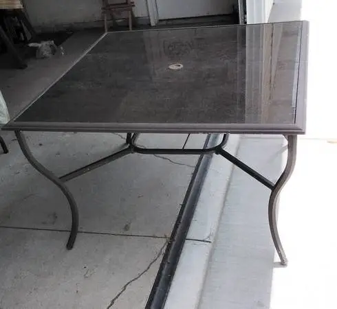 Glass top square patio table 44-1/2 W 27-1/2T