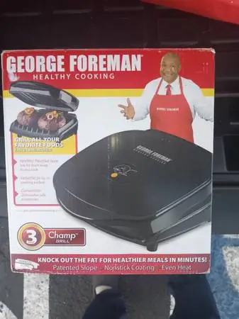 GEORGE FOREMAN CHAMP GRILL NEW IN BOX