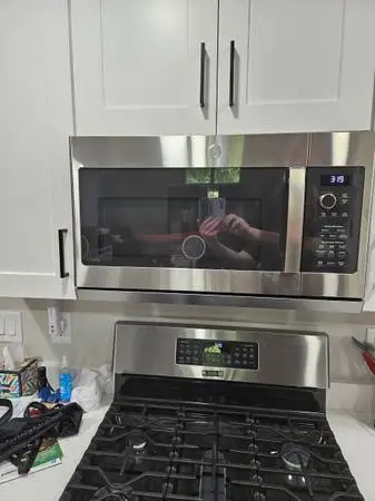 GE Profile 2.2-cu ft Over-the-Range Microwave with Sensor Cooking