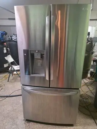 LG 31 cubic feet stainless french door with hidden door REFRIGERATOR