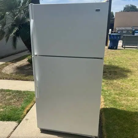 Refrigerator works perfect delivery available locally 65 tall 33 wide 30 deep