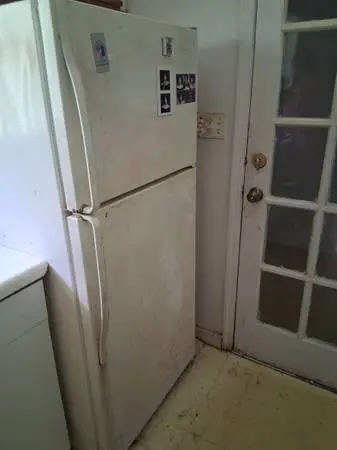 Whirlpool refrigerator for sale (37 by 62 ins)