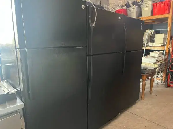 Top and bottom black refrigerators