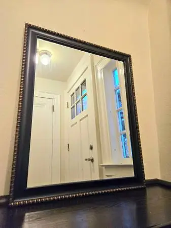 Orante Black Framed Beveled Mirror With Gold Detailing