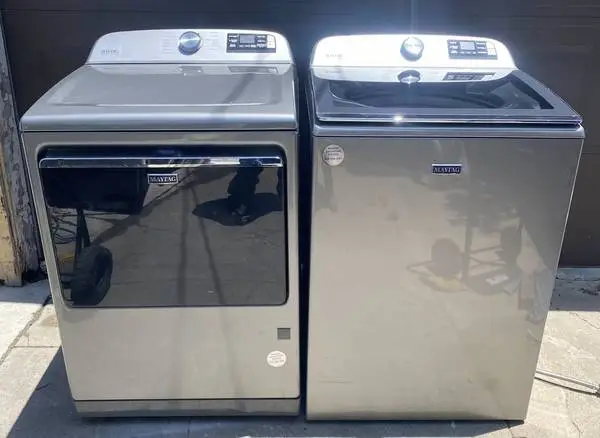 Maytag extra large top load washer and gas dryer woth crack