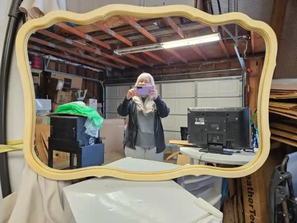 1972 French provincial wall hanging mirror by Lenoir.
