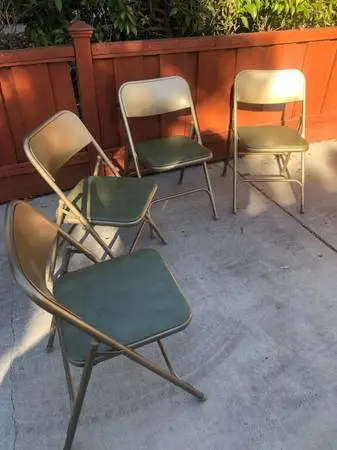 4 folding metal chairs, cushioned.