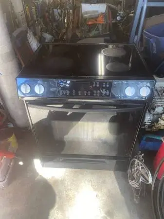 WHIRLPOOL BLACK ELECTRIC RANGE