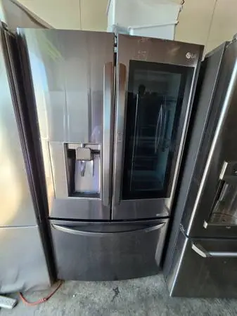 Lg black stainless steel instaview refrigerator with blemish
