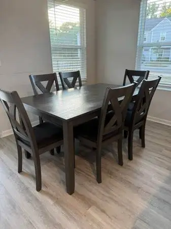 Like new kitchen table that sits 6 people with chairs