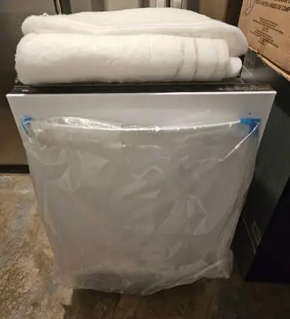 WHITE WHIRLPOOL DISHWASHER.....NEW...$ 220
