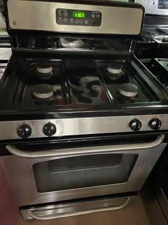 #### GE BLACK n STAINLESS STOVE WITH SELF CLEANING ###