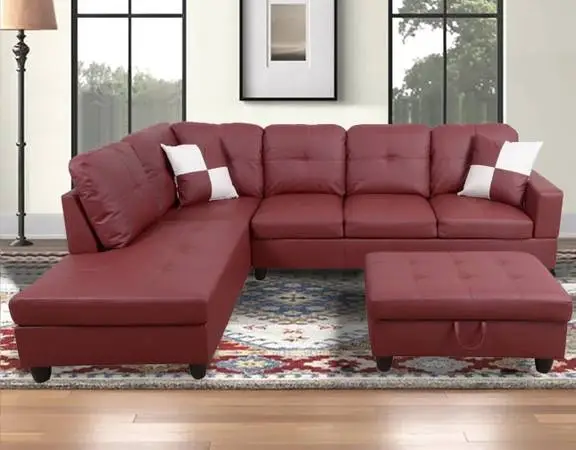 Maroon red leather sectional couch and ottoman