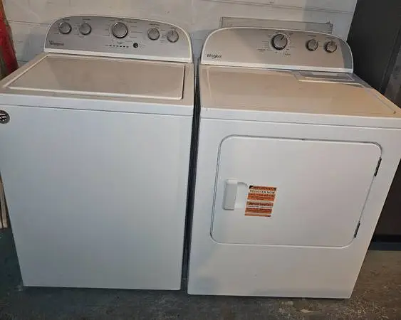 WHIRLPOOL TOP LOADER WASDHER AND DRYER SET......$ 500